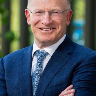 Dr John R. Adler, Jr.